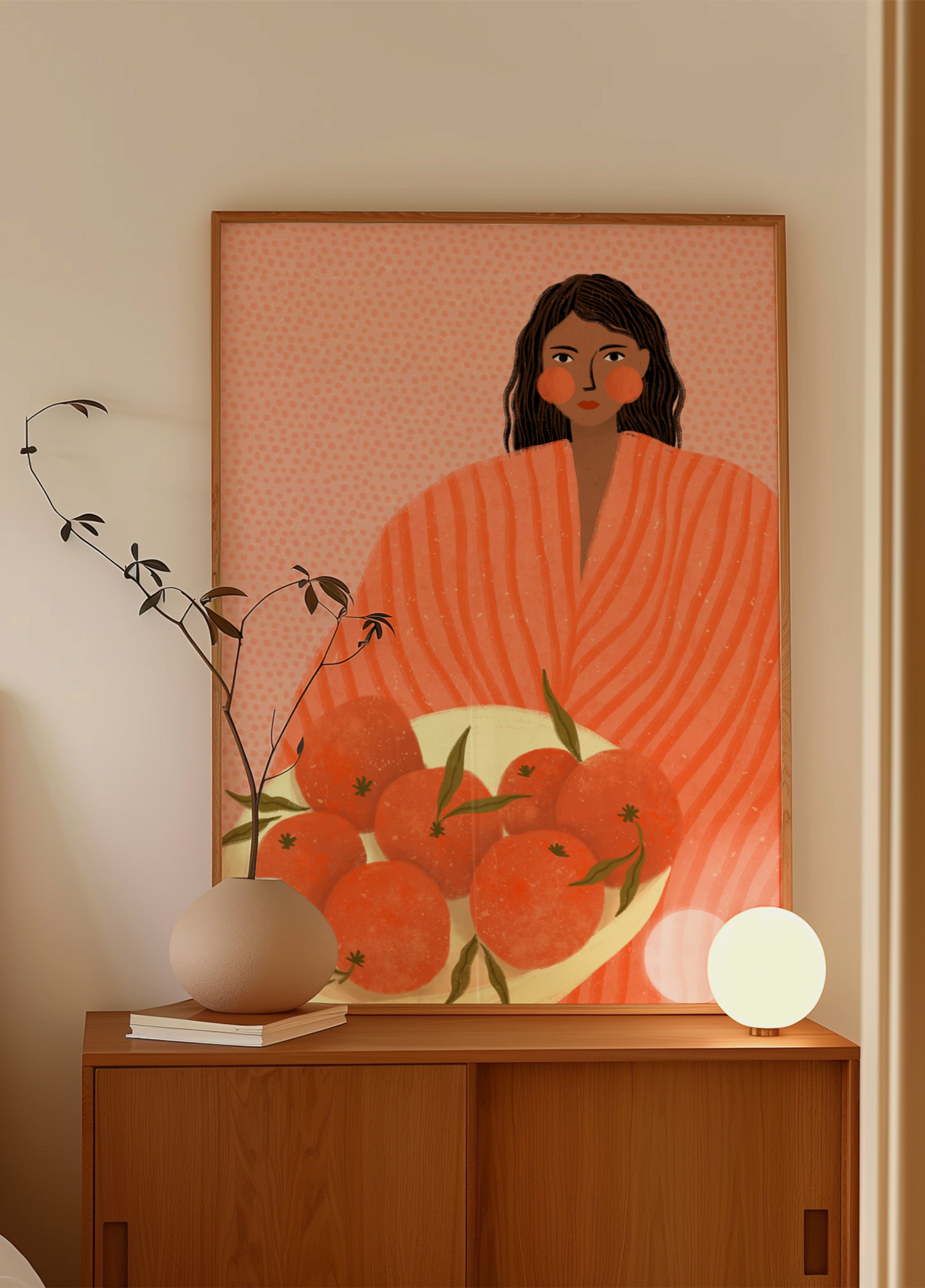 Frau hält Orangen